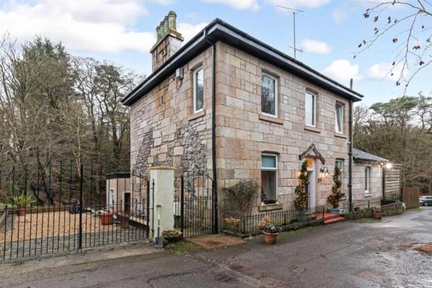 Take a look inside this luxury sandstone villa with tranquil waterfall and bar
